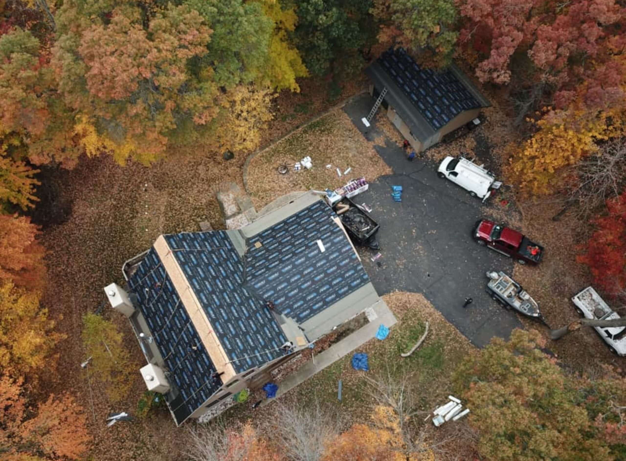 Aerial view of a roof replacement in progress